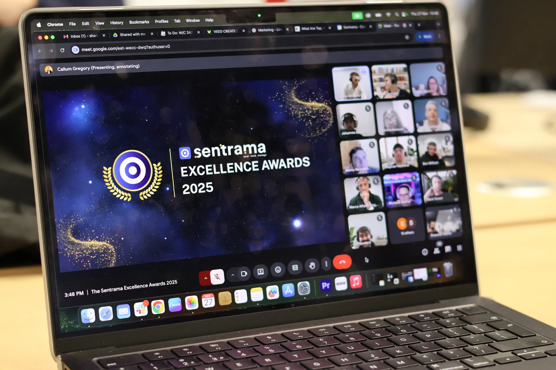 A laptop showing the virtual Sentrama Excellence Awards 2025 video call